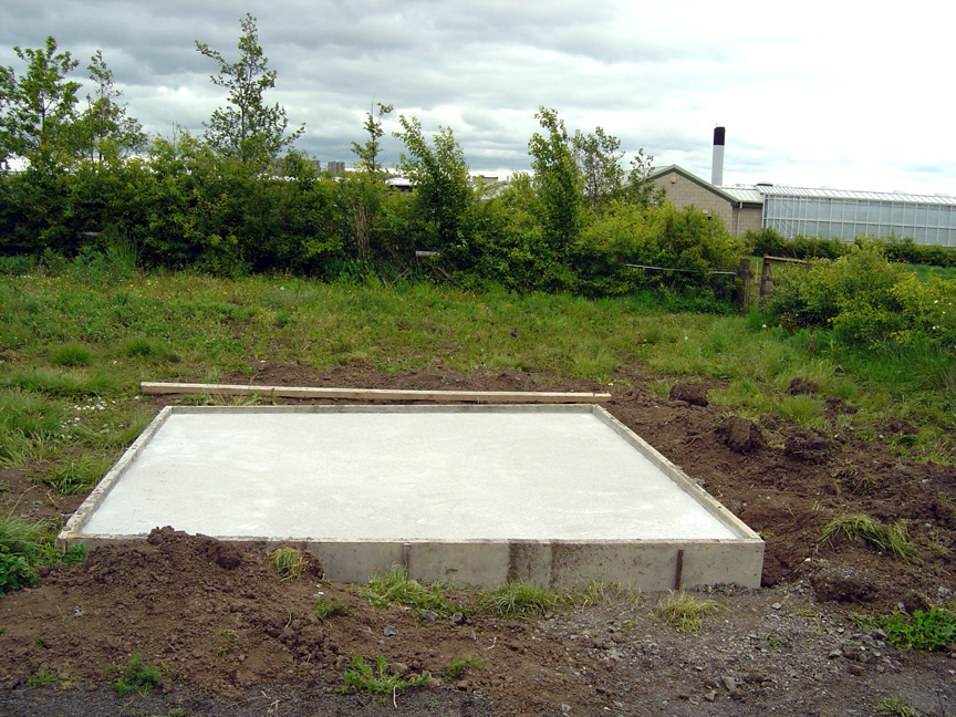 The concrete base is laid.